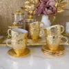 Inspire Me! Home Decor Gold Textured Metal Tea Cup And Saucer With White Interior 1 Inspire Me! Home Decor Gold Textured Metal Tea Cup And Saucer With White Interior