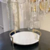 Inspire Me! Home Decor Gold Modern Handle Round Marble Tray